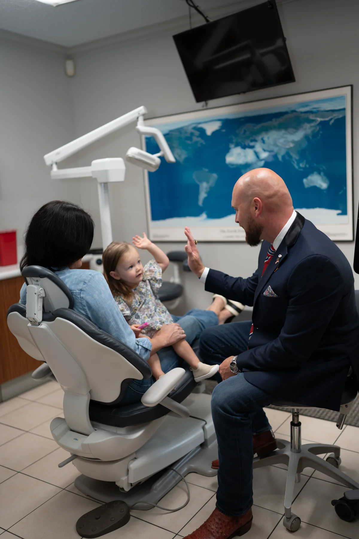 Dr. Hauser with a young patient